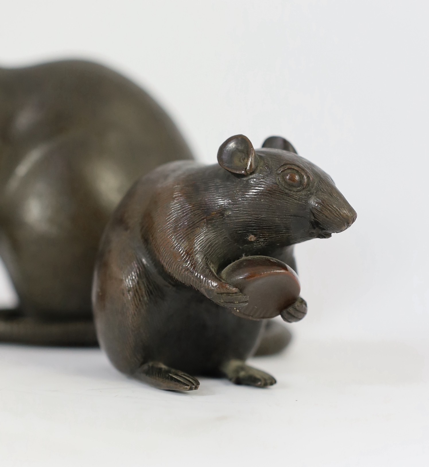 An assembled group of five Japanese bronze and mixed metal models of rats, Meiji period, smallest 9.5cm long, largest 16.5cm long, one small rat tail detached